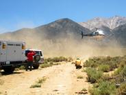Mutual Aid Search for a Missing Hiker on Boundary Peak