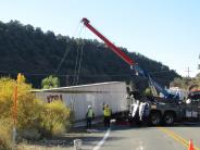 Photo of overturned big rid on side of road