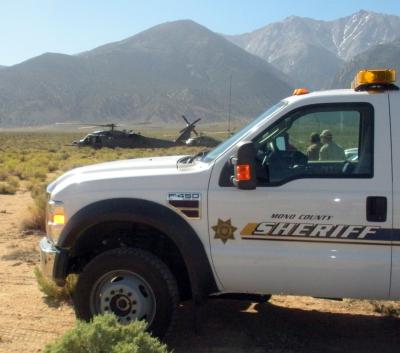 Mutual Aid Search for a Missing Hiker on Boundary Peak